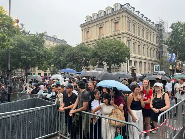 Fans at the Paris Olympic opening ceremony