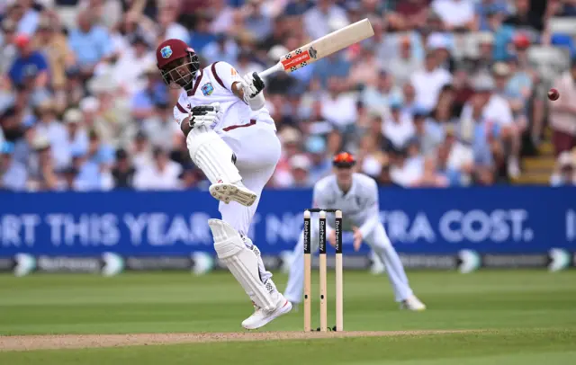 Kraigg Brathwaite plays a short ball from Mark Wood