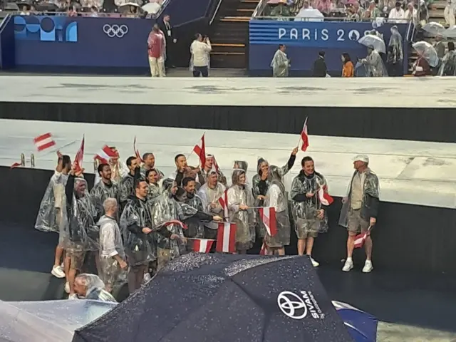 The Austrian Olympic team in the Paris Trocadéro following their trip along the river Seine as part of the Olympic opening ceremony