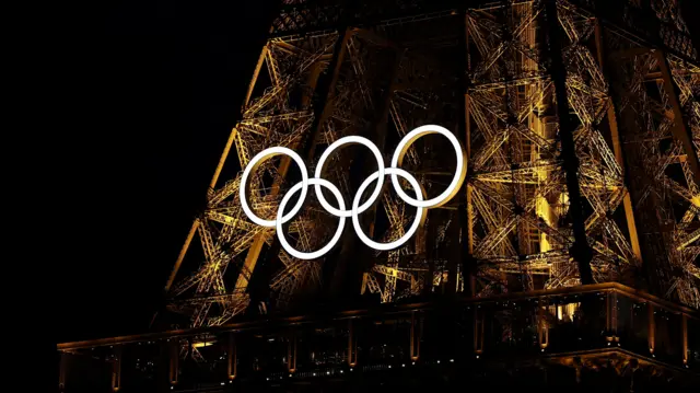 A general view of the Olympic rings on the Eiffel Tower.