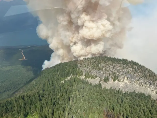 Smoke rises as the Southeast Fire Centre has seen an increase in activity over the last few days with over 1,600 lightning strikes resulting in 126 new fires in British Columbia, Canada on July 23, 2024.