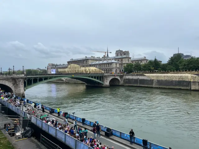 Fans wait on the Seine