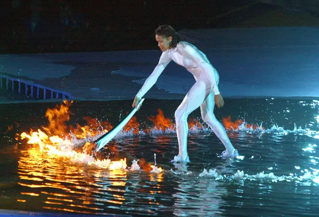 Cathy Freeman lighting the torch in Sydney