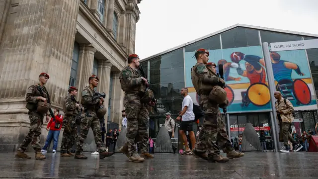 French military personnel patrol outside Gare du Nord station in Paris, France