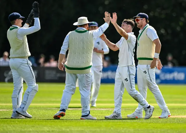 Celebrations for Ireland as Curtis Campher takes the wicket of Prince Masvaure