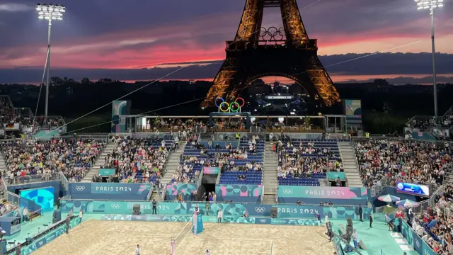 Eiffel Tower in background of beach volleyball venue