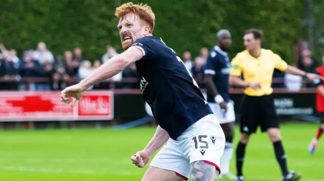 Simon Murray celebrates