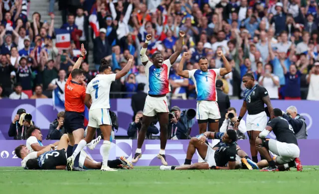 France celebrate at the full time whistle