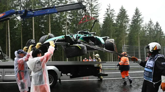 Lance Stroll's car being recovered