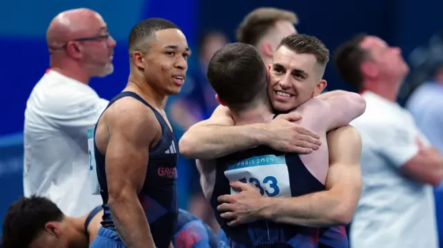 Great Britain's Max Whitlock with Harry Hepworth and Joe Fraser during the Artistic Gymnastics, Men's Qualification at the Bercy Arena