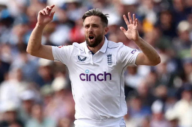 Chris Woakes reacts