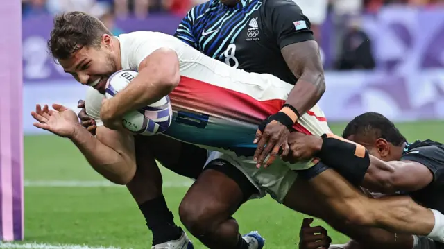 Antoine Dupont of France scores a try during the Men Gold Medal match between France and Fiji in the Paris 2024 Olympic Games