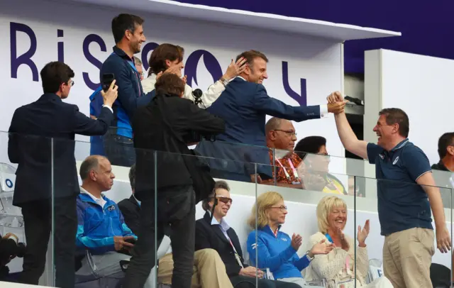 President Macron celebrates in the stands