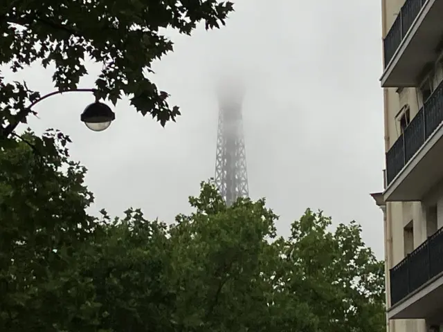 Eiffel Tower shrouded in cloud