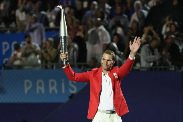 Rafa Nadal with the Olympic flame