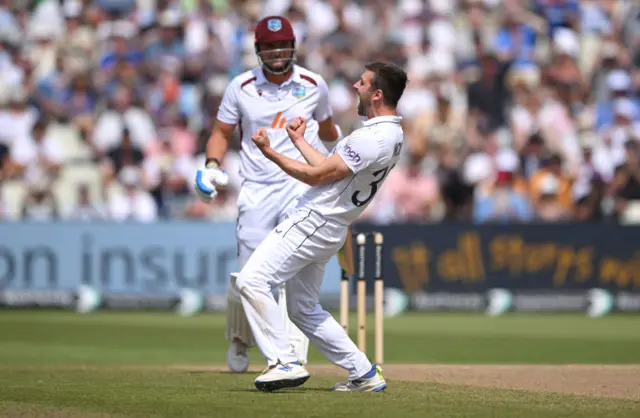 Mark Wood celebrates the wicket of Josh Da Silva