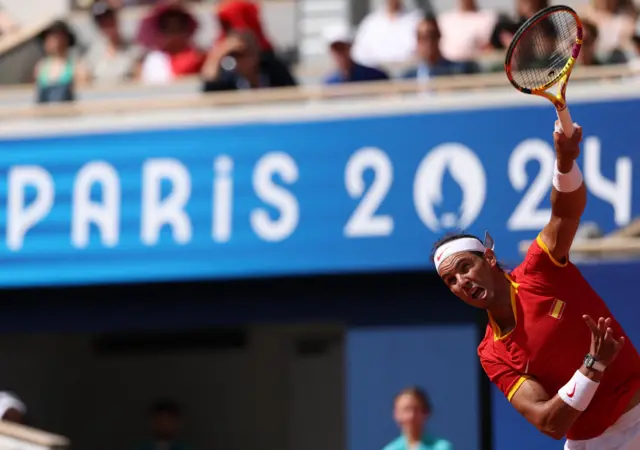 Nadal serves on Philippe Chatrier