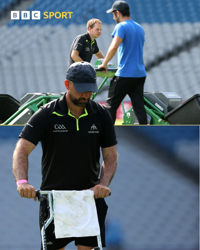 Groundsmen prepare the pitch ahead of the game at Croke Park