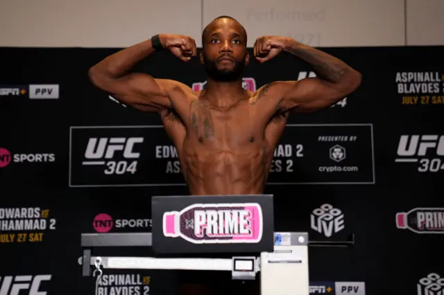 Leon Edwards holds out his arms