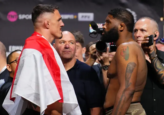 Tom Aspinall and Curtis Blaydes stand face-to-face