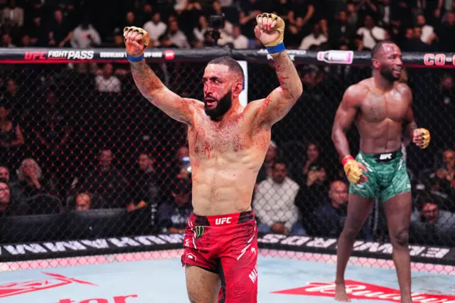 Belal Muhammad celebrates beating Leon Edwards