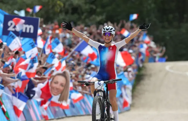 Pauline Ferrand-Prevot celebrates winning her gold medal in mountain bike