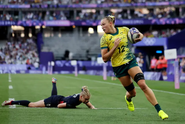 Maddison Levi goes over for an Australia try