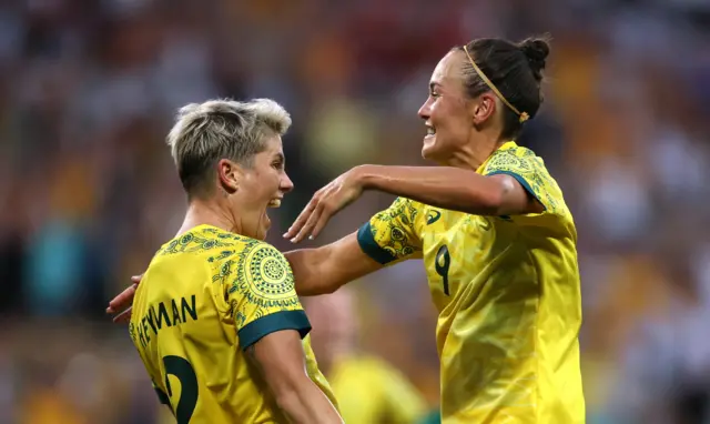 Michelle Heyman of Australia celebrates scoring their sixth goal with Caitlin Foord of Australia.