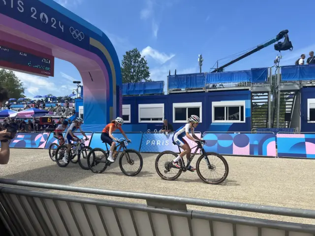 Riders through lap one