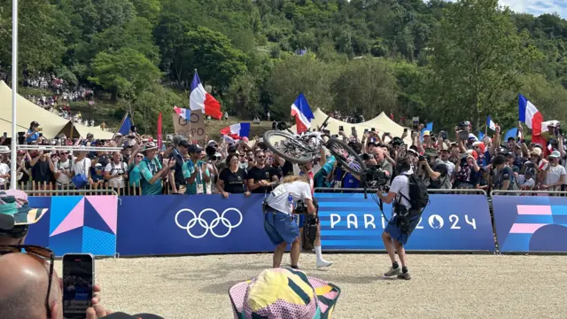 ferrand prevot lifts her bike