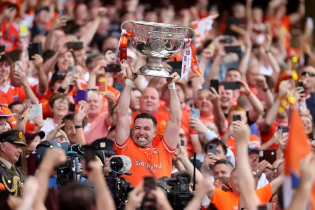 Aidan Forker lifts Sam Maguire