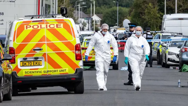 Forensic officers in Southport