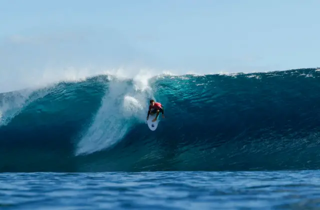 Australia's Jack Robinson dropping onto a wave