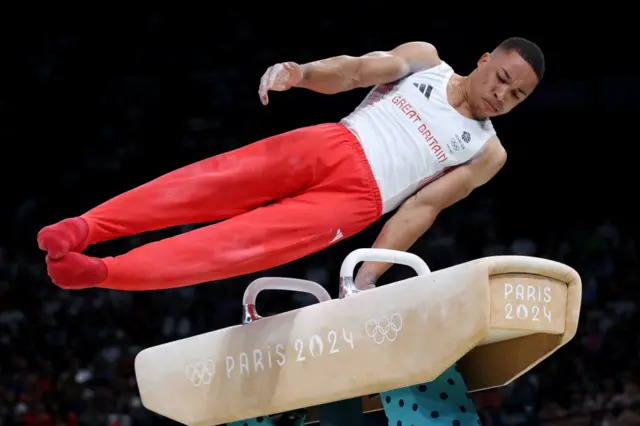 Fraser does his routine on the pommel horse