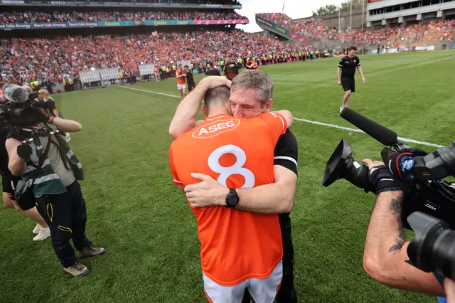 Niall Grimley celebrates with Kieran McGeeney