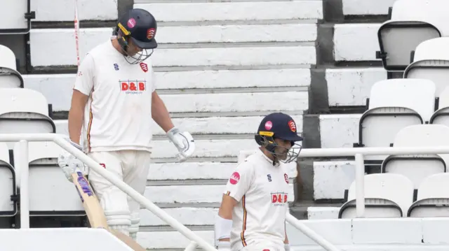 Tom Westley and Dean Elgar coming down the steps to bat at Kia Oval