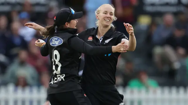 Hannah Rowe celebrates the wicket of Tammy Beaumont