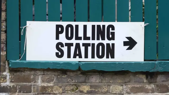 A polling station sign