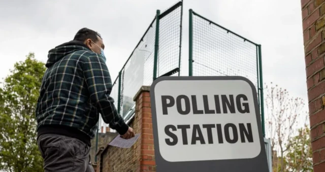 Voter at polling station