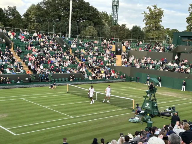 Gael Monfils and Stan Wawrinka hugging