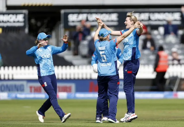 England’s Lauren Bell (left) celebrates taking the wicket of New Zealand’s Sophie Devine (not pictured) during the third Women's One-Day International at the Seat Unique Stadium, Bristol