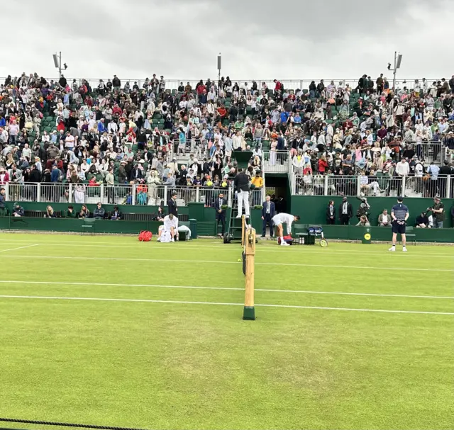 Dan Evans leaving court 12