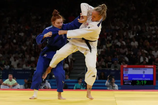 Judo match in action