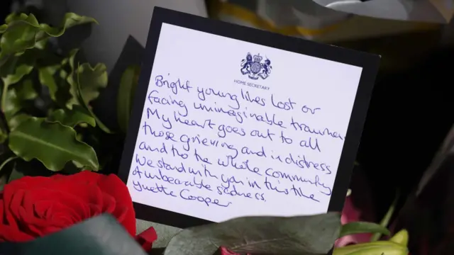 A message in a bouquet of flowers from Home Secretary Yvette Cooper