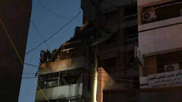 A view of a destroyed corner of a high-rise building