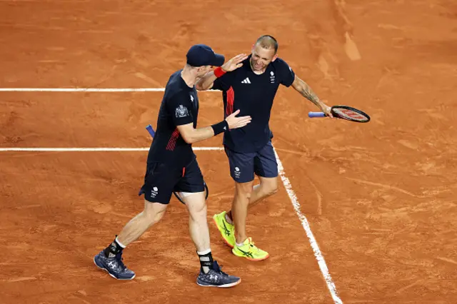 Andy Murray of Team Great Britain celebrates with partner Dan Evans