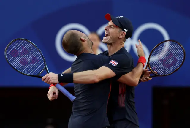 Andy Murray hugging Dan Evans after Sunday' doubles win