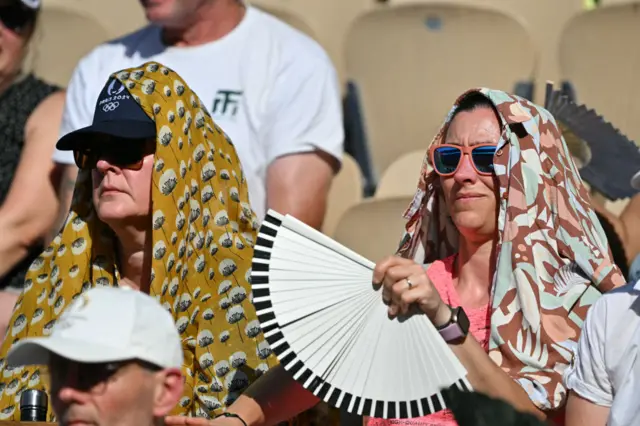 Tennis fans trying to keep cool