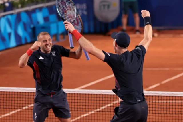 Andy Murray of Britain and Daniel Evans of Britain celebrate