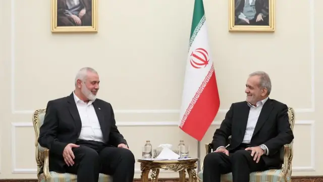 Iranian President Masoud Pezeshkian meets with Palestinian group Hamas' top leader, Ismail Haniyeh, in Tehran, Iran, July 30, 2024.